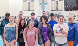 se-consortium-swim-2025 A group photo of teen and young adult swim team members.