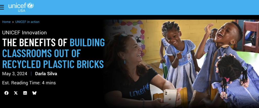 Screenshot of a post and image from the UNICEF USA Innovation blog depicting a UNICEF executive with school children in a classroom.