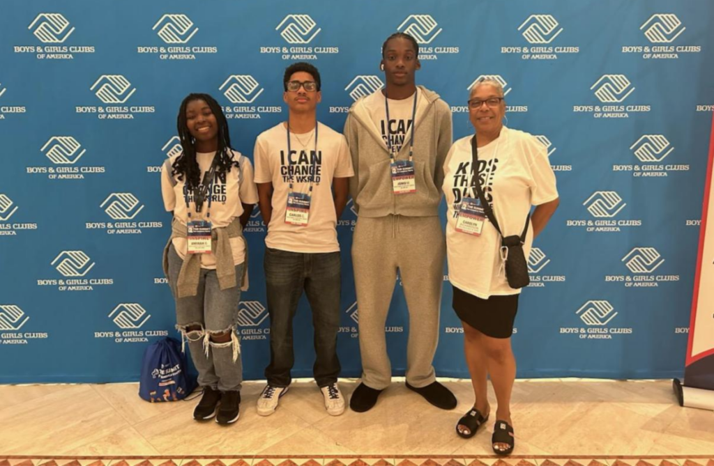 Photo of local teen representatives attending a leadership summit in Washington, D.C., with a mentor.